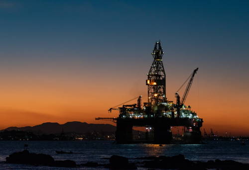 Drilling rig at sunset
